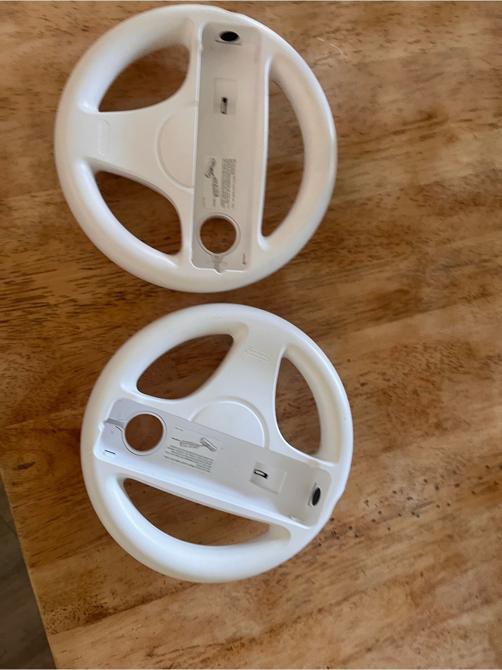 WII.  White Pair of Game Steering Wheel Controllers